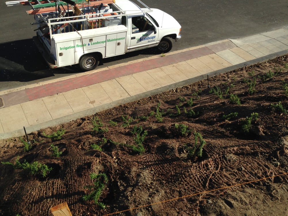 Burgio Landscape Services Branded Heavy Service Truck on El Cajon Bank Erosion Control Site