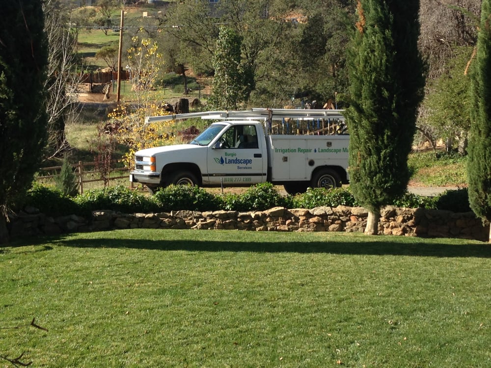 Burgio Landscape Services Utility Truck and Crew at Alpine Retaining Wall and Synthetic Turf Build